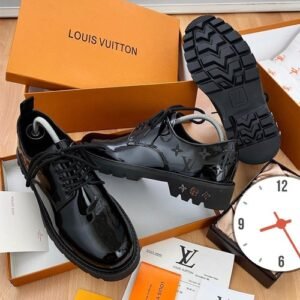 Louis Vuitton shiny leather designer corporate
