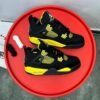 AIR JORDAN 4 RETRO "YELLOW THUNDER" SNEAKERS
